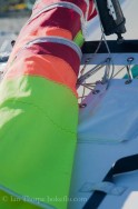 An Image of a rolled up sail on Hobie Cat catamaran