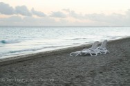 Beach Chairs in the Sand by the Surf