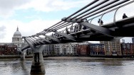 a view of the Millennium Foot Bridge from the south side of the Thames River London England