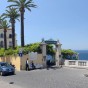The entrance of the cliff top Hotel de la Syrene in Sorrento Italy with its palm trees and Mediterranean architecture