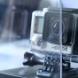 The photograph is a close up of the GoPro Hero 4 Black Edition iin it's box on a bit of an angle so the side and front are visible with the Hero 4 logo very prominent on the front of the GoPro