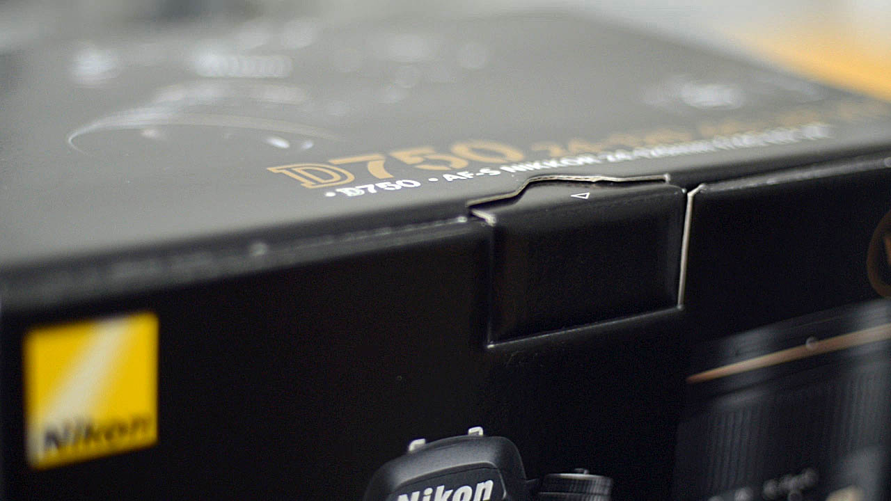 The photograph is a close up of the box the Nikon D750 DSLR camera body and the Nikkor AF-S 24-120 f4 lens kit comes in