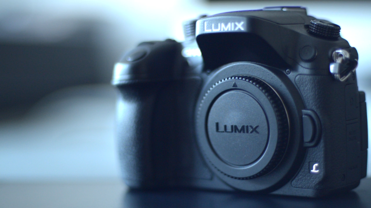 The Photograph shows the Panasonic Lumix GH4 camera body from a low angle