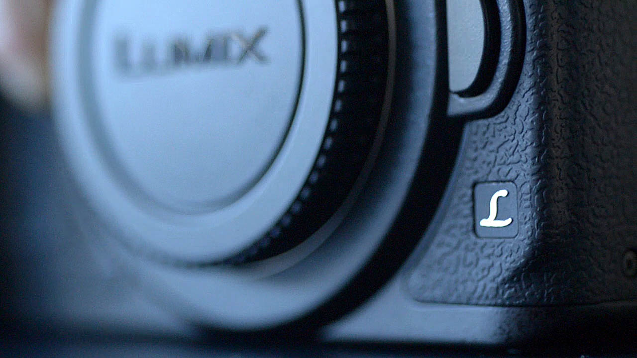 The Photograph shows low angle close up of the Panasonic Lumix GH4 camera body