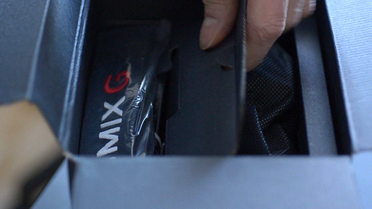 The Photograph shows the Panasonic Lumix GH4 camera strap that come with the Panasonic GH4 camera in the box.